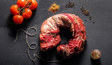 Beautiful cut of beef with tomatoes and spices